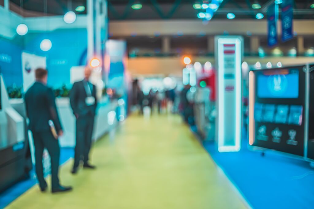 Brand representatives engaging customers during an event promotion campaign